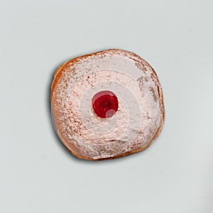 Top view closeup of a Hanukkah mocks sufganiyah doughnut photo