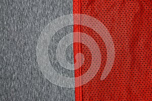 Top view of cloth textile surface. Close-up rumpled heater and knitted fabric texture with a thin striped pattern. Sport clothing