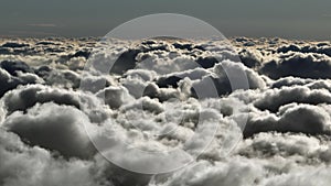 Top view of the clouds in the morning light. Aerial view of cumulus clouds.