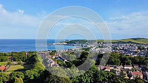 Top view of the coastal town of Lyme Regis with a prospering nature