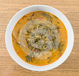Top View Coconut Milk Curry with Cassia Leaves