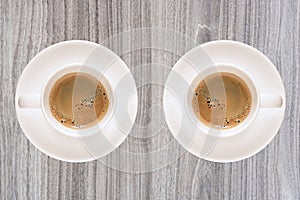 Top view coffee cup on nature wood texture