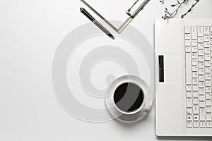 Top view coffee cup with notebook,pen or object for office supply concept on white background
