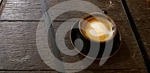 Top view of a coffee cup on a table