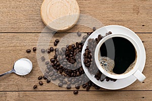 Top View coffee cup on the wooden table background.