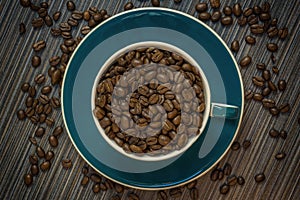 Top view of cup with coffee beans
