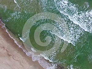 Top view of cold stormy and harsh Baltic sea photographed with a drone.