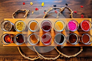 top view of colorful beer flight sampler on bar