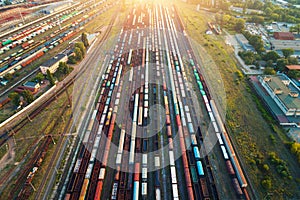 Top view of colorful cargo trains. Aerial view