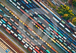 Top view of colorful cargo trains. Aerial view