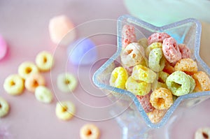 Top view of Colorful Fruit Loops Cereal in Star Shape Cup