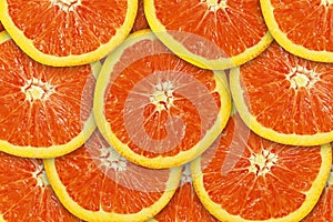 Top view of colorful orange fruit slices for background or wallpaper photo