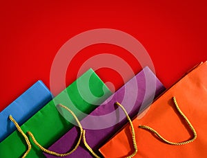 top view of colorful paper shopping bag