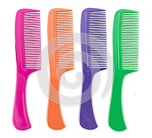 Top view - Colorful plastic comb isolated on white