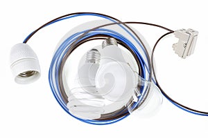 Top view of components of the electrical system on white background.