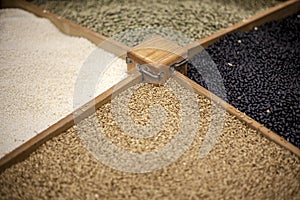 Top view composition  with cereals like buckwheat maize rice peas haricot millet oats beans poppy seed herbage