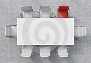 Top View of a conference room. A white rectangular table and eight chairs around, one of them is red. Office interior. 3D