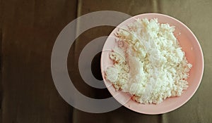 Top view, cooked rice on table with space