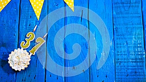 Top view copy space background festive on vintage blue boards with pie and decorations. Background congratulations on your birthda