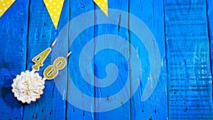 Top view copy space background festive on vintage blue boards with pie and decorations. Background congratulations on your birthda