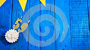 Top view copy space background festive on vintage blue boards with pie and decorations. Background congratulations on your birthda