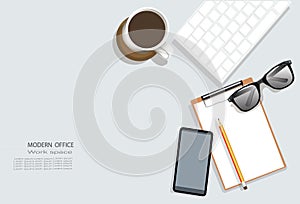 Top view with copy space of modern office with white workispace with laptop, note book, smartphone, cup of coffee and other