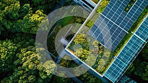 Top view of a corporate facility with a green roof and solar panels, indicating commitment to environmental