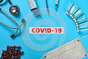 Covid 19 surrounded by medical things concept of fighting with the SARS COV 2 photo