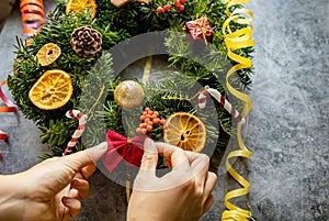 Top View Of Creation Of Christmas Wreaths With Fir Branches photo