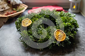 Top View Of Creation Of Christmas Wreaths With Fir Branches photo