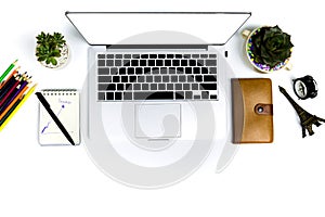 Top view creative flat lay photo of modern workplace with laptop, top view laptop background and copy space on white background,