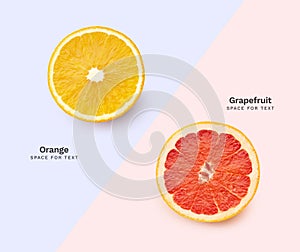 Top view creative layout with orange and grapefruit slices