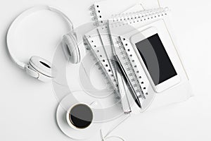 Creative table top with devices and supplies