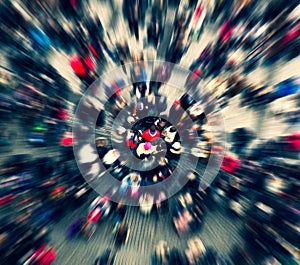 Top view of the crowd with zoom effect on a person in the middle