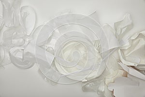 View of crumpled plastic cups, plates