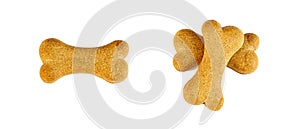 Top view of crunchy brown bone shaped dog biscuit as a treat set isolated on white background close up.