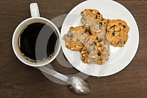 Top view on cup of coffee and  chocolate  chip cookies