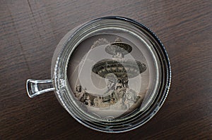 Top view of cup of coffee on the table with Fontaine des Mers Fountain of the Seas, Concorde Square, Paris