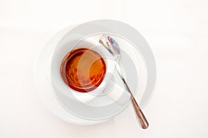 Top view of a cup of coffee, on white