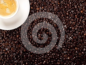 Top view of a cup of dark roasted coffee