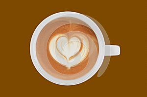 Top view of cups of coffee latte on colour background
