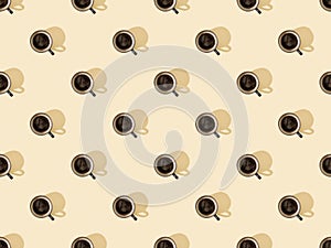 Top view of cups of fresh coffee on beige