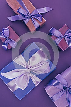 top view of decorative gift boxes with ribbons and bows