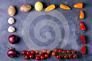 Top view of delicious ingredients for healthy cooking or salad making on slate vintage background. Bio Healthy food