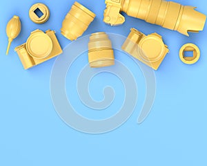 Top view of designer workspace and photography gear on blue table background