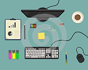 Top view of a desk background, where there is a monitor, keyboard, computer mouse, office elements, stationery and cup of coffee
