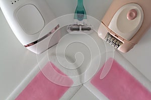 Top view of different hair removal methods at home