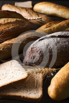 Top view of different kinds of bread with cereals