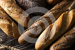 Top view of different kinds of bread with cereals