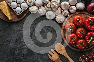 top view of different raw ingredients for pizza